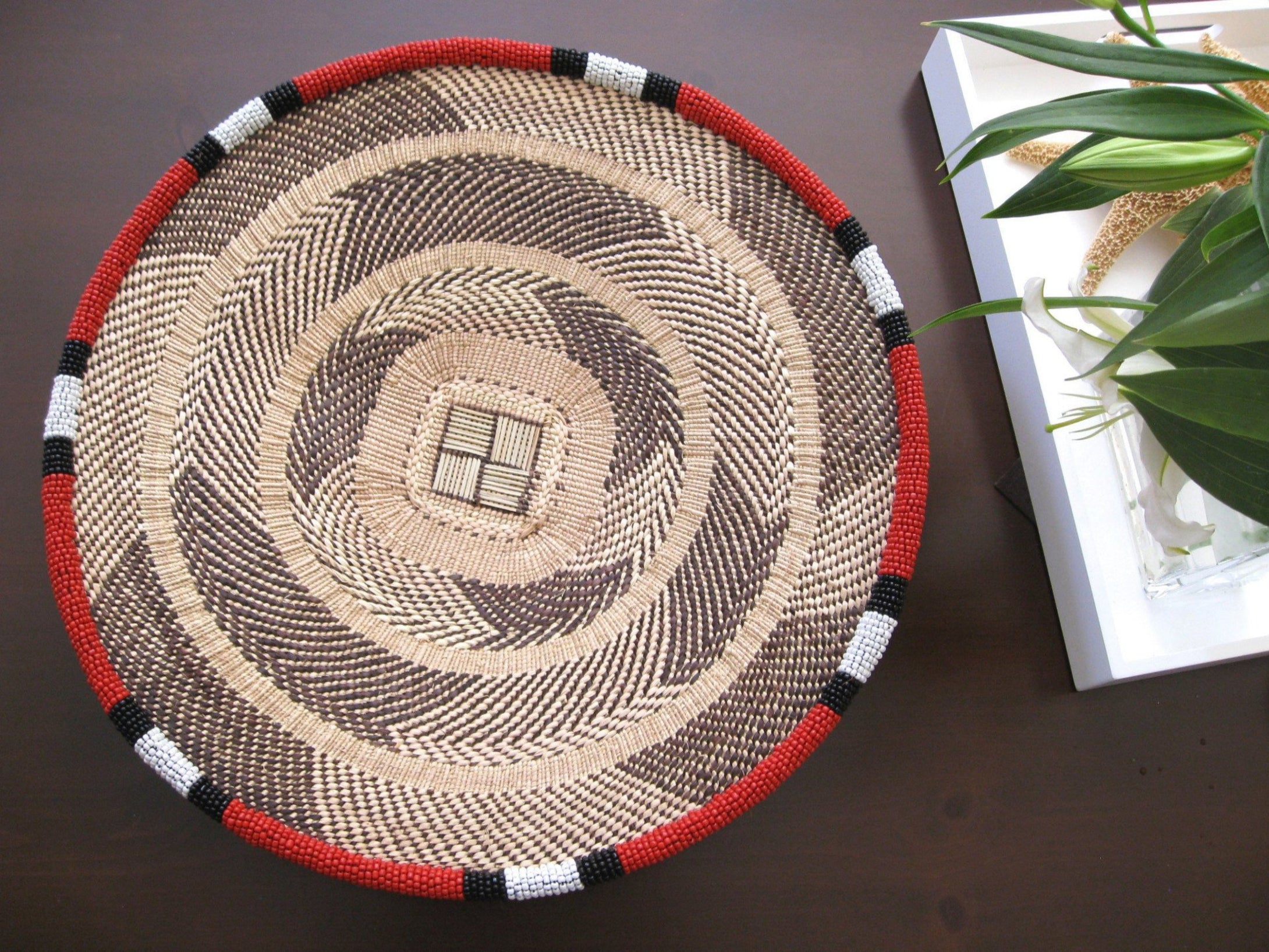 THANDA RED, WHITE AND BLACK BEADED BASKET - RED GEOMETRICS SOLD