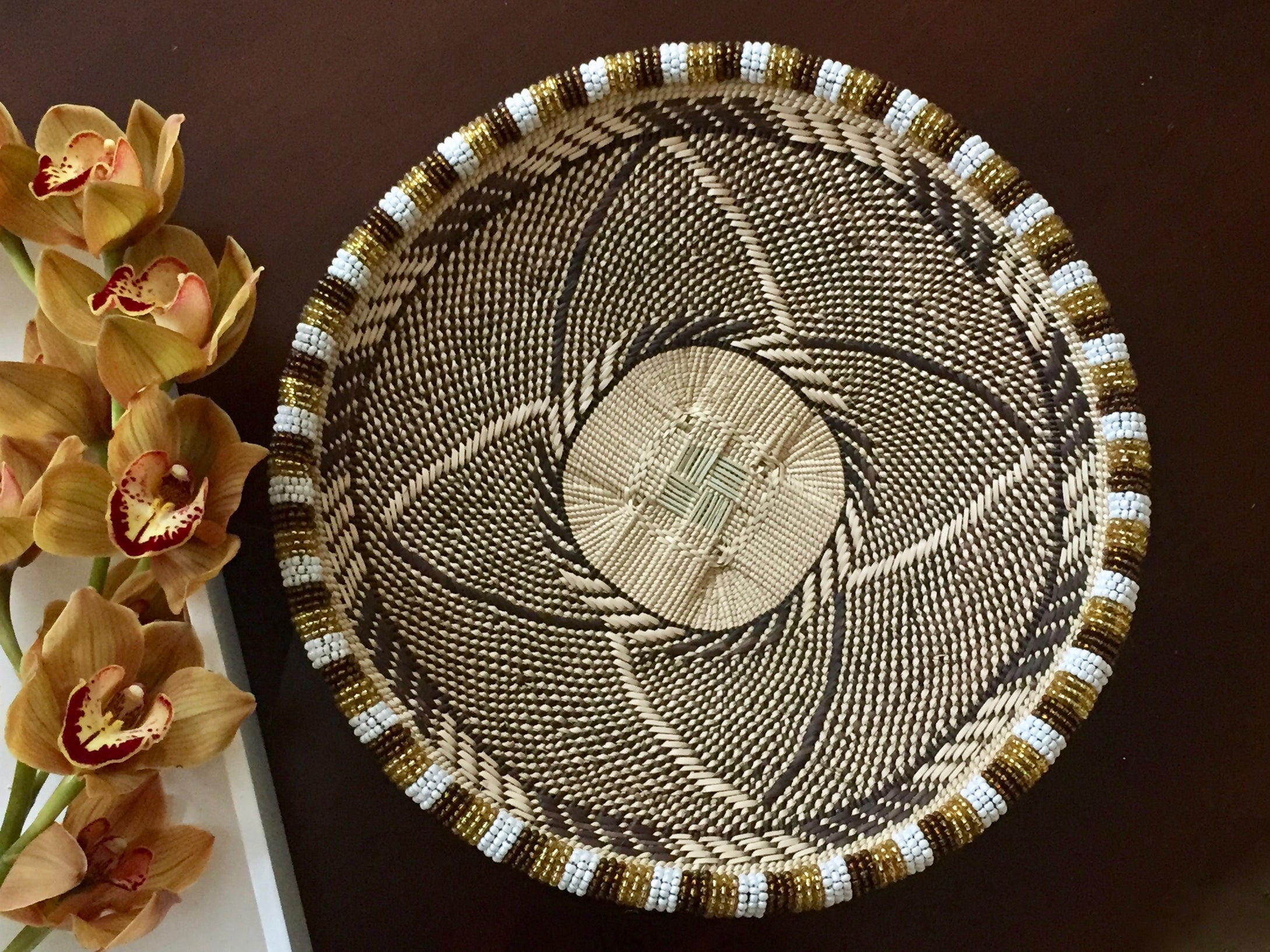 Small gold, white and brown beaded basket